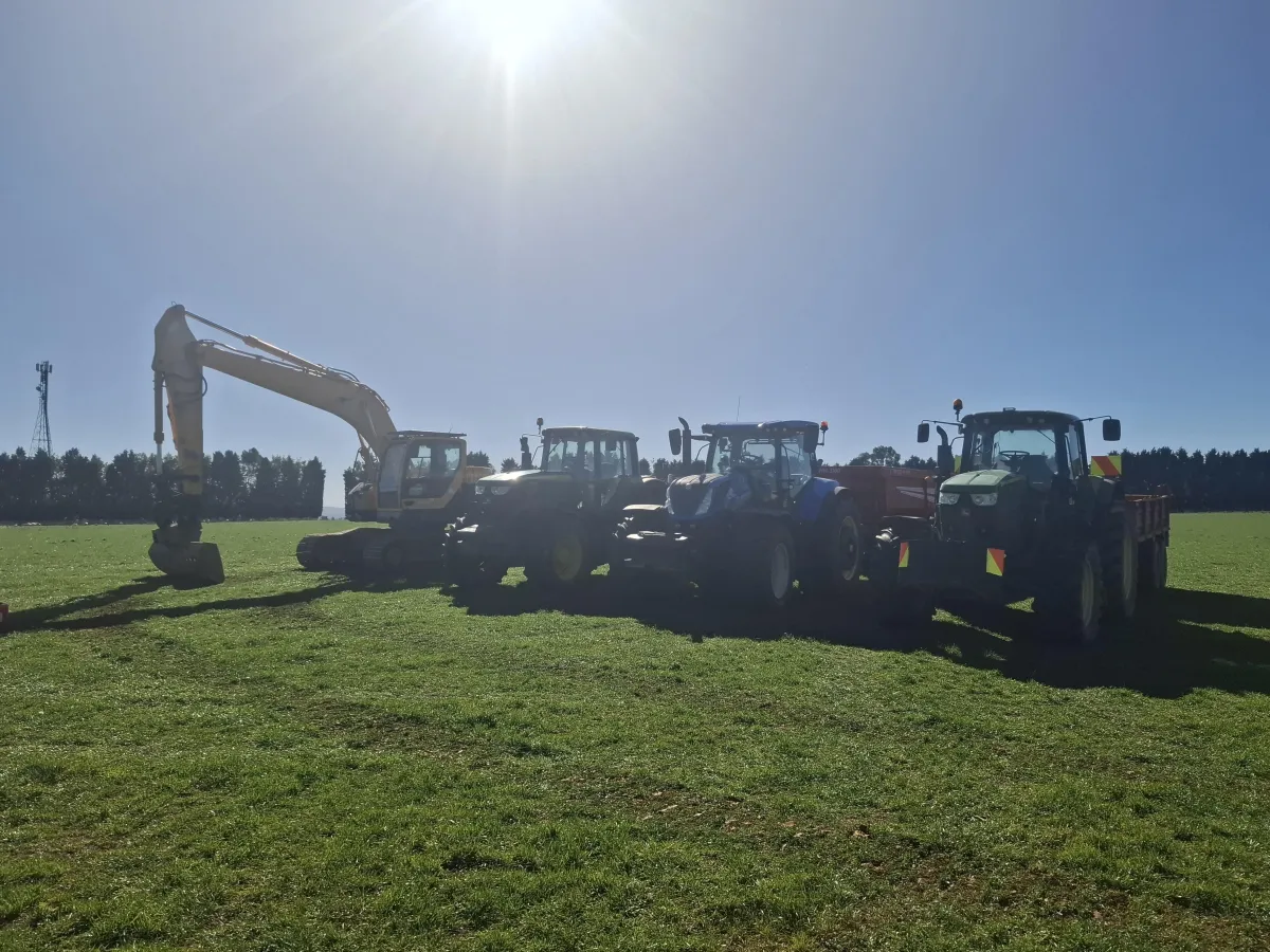 Tractor and trailer services for hauling gravel, rock, and materials on farm and construction projects by Dean Moore Excavation.