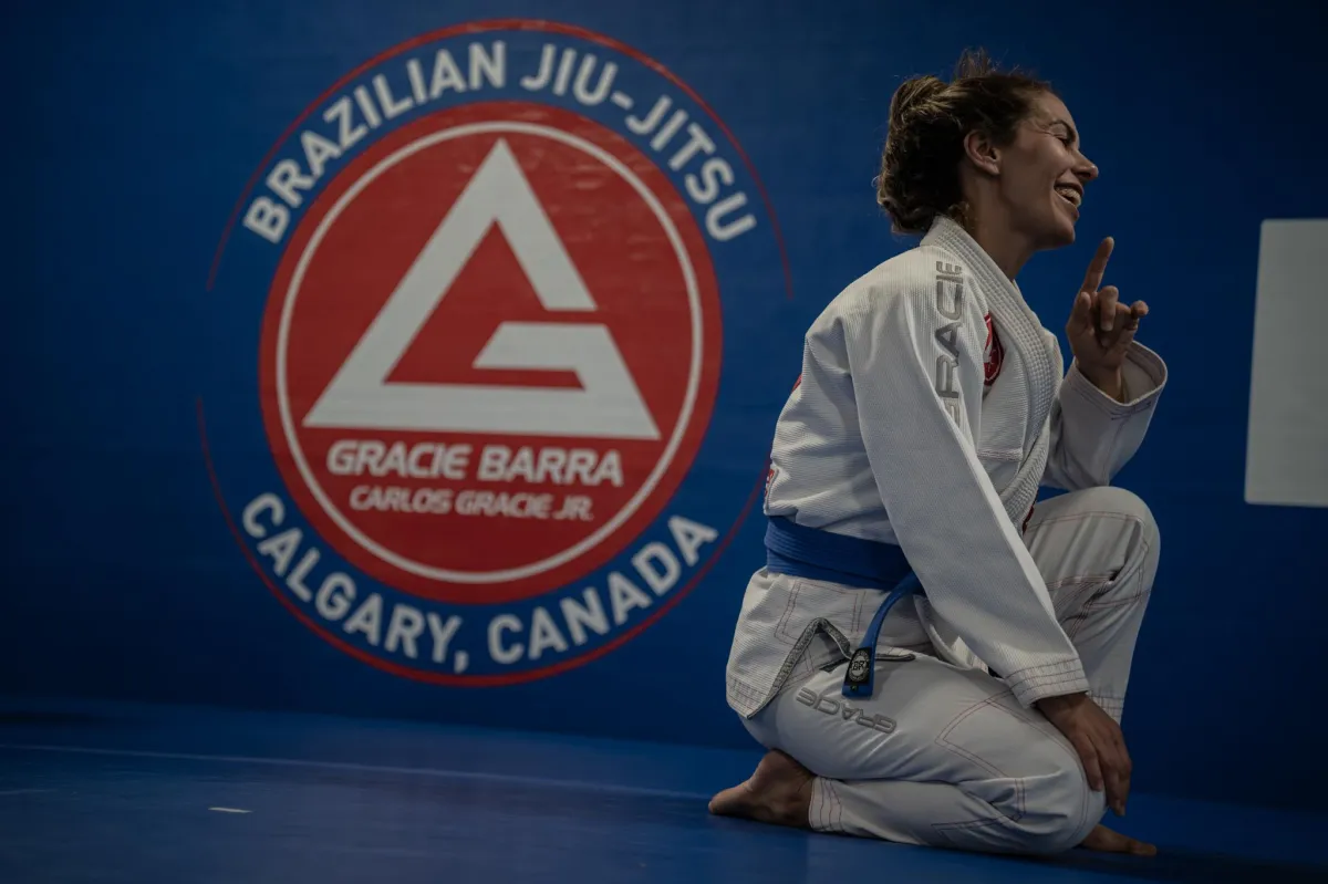 a person writing on a whiteboard