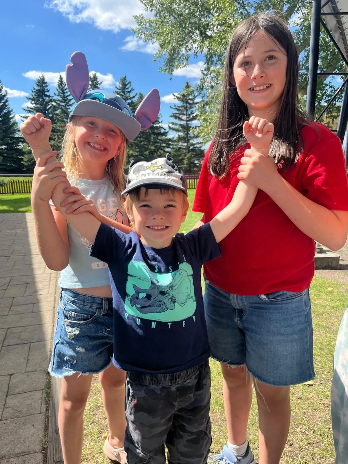 A nude dancer performs a complex movement on the floor.