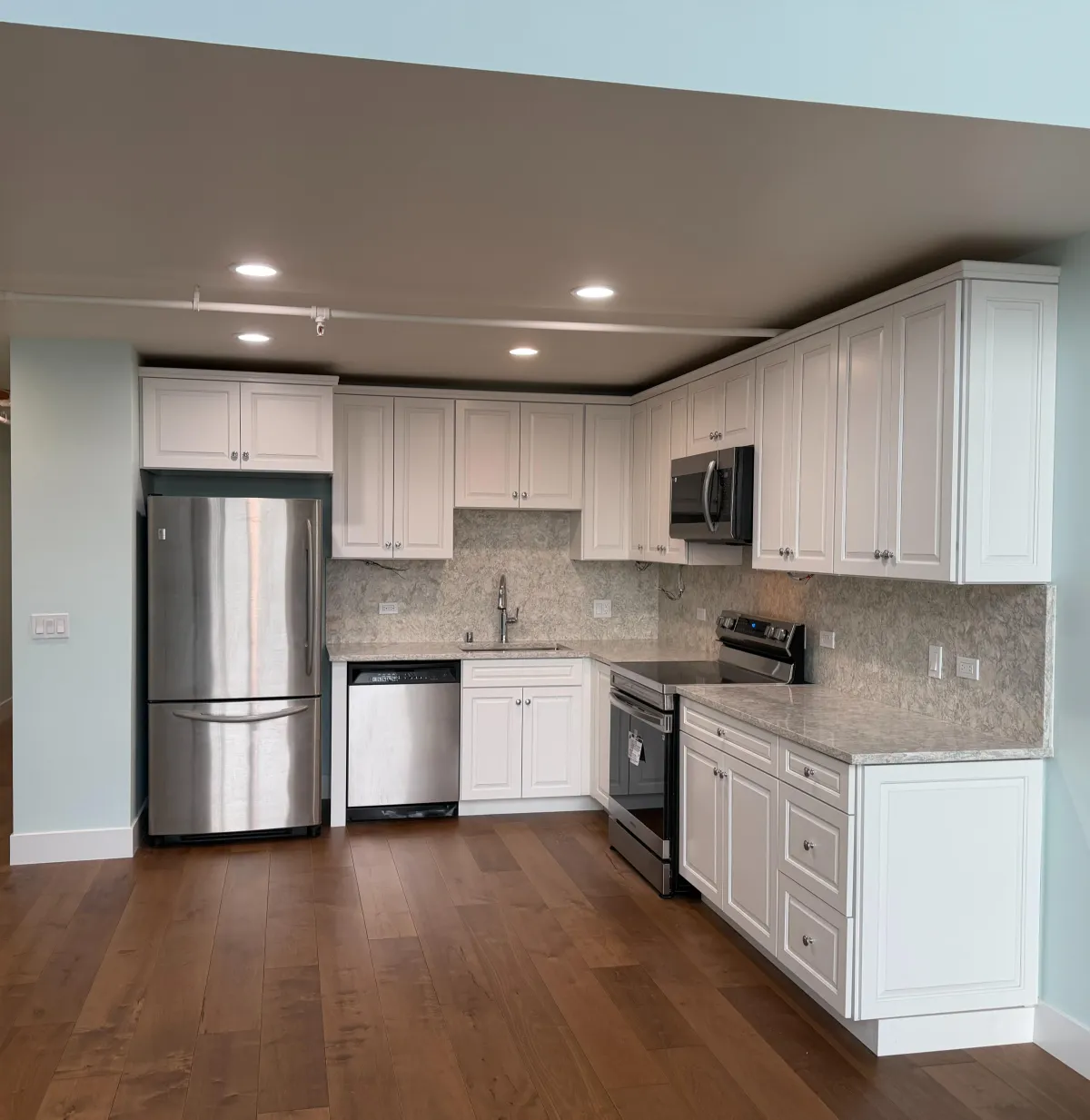 white kitchen remodeling project with 