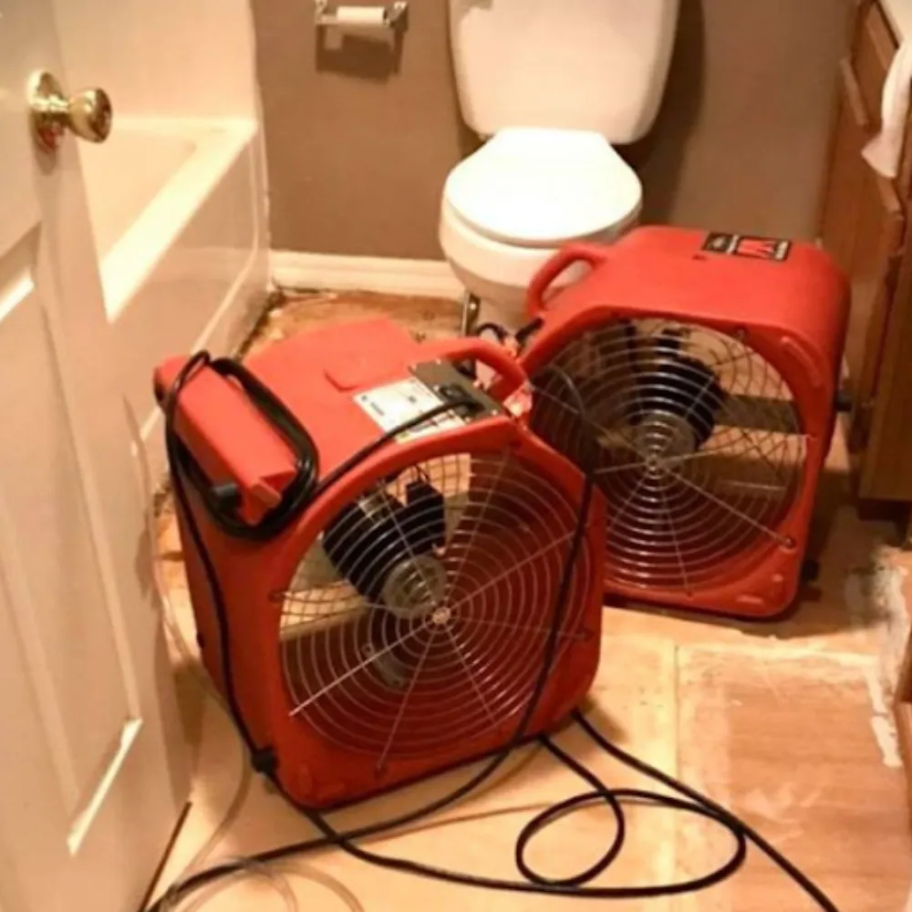 water damage drying equipment in a knoxville bathroom restoration