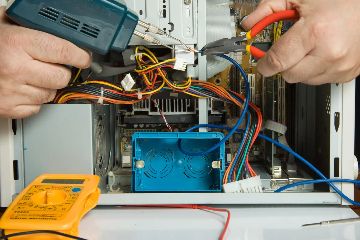 Professional electrician working at a breaker panel