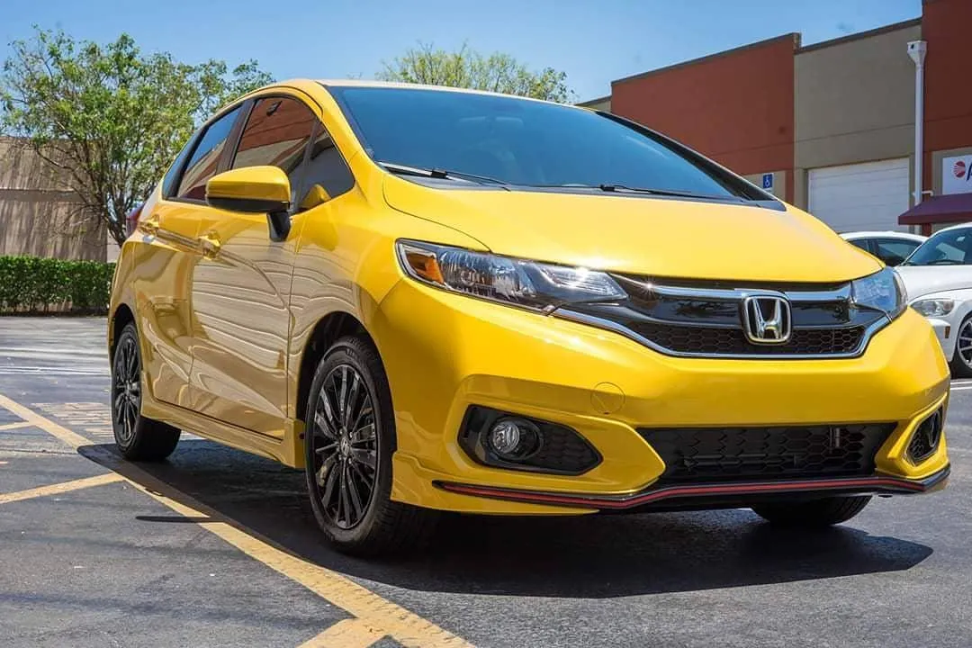 Window Tint to Yellow Honda at Miami, Florida