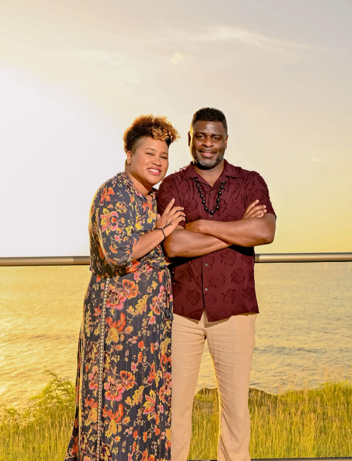 Black couple kissing at sunset during luxury retreat experience