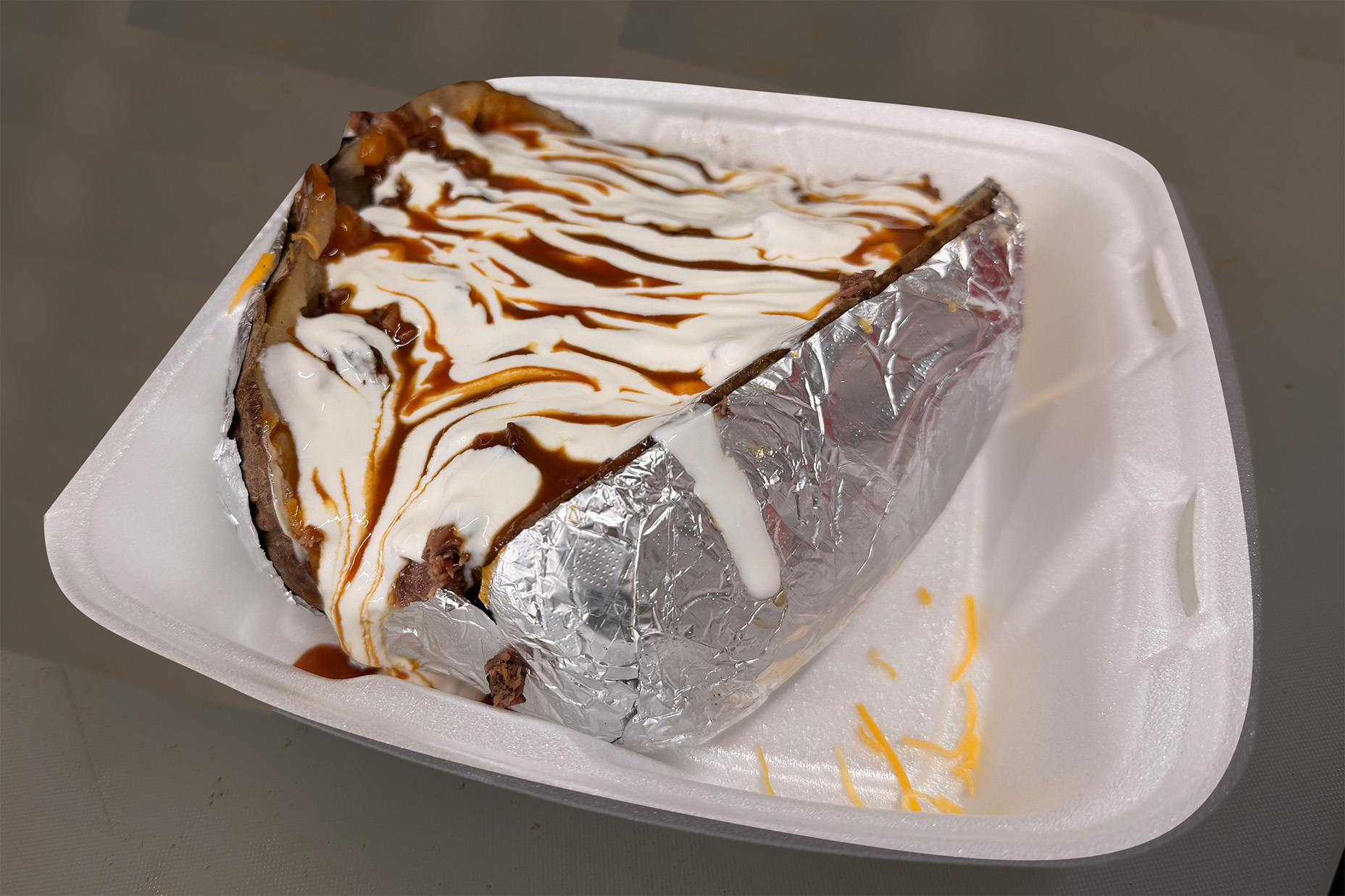 Loaded baked potatoes and nachos