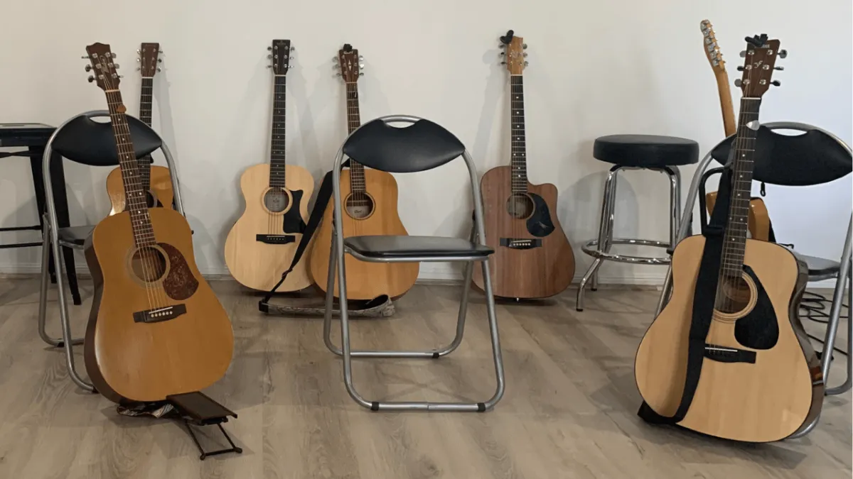 There's always a seat waiting for you and your guitar at guitar lessons, Carrara, QLD. 4211