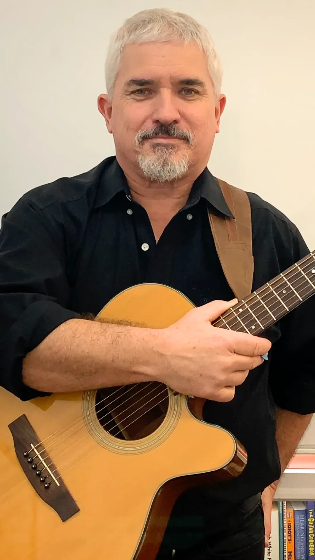 Allen Hopgood, founder of The Campfire Club, the premium guitar expericence for adults 40+ on the Gold Coast