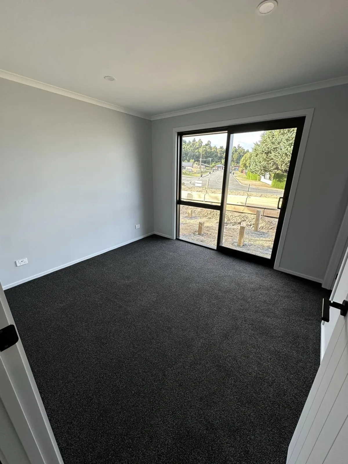 Freshly cleaned carpet in residential bedroom