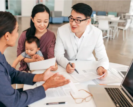 family with expert advisor discussing insurance plans