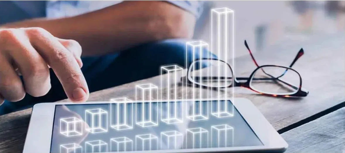 A stack of books sitting on top of a white shelf