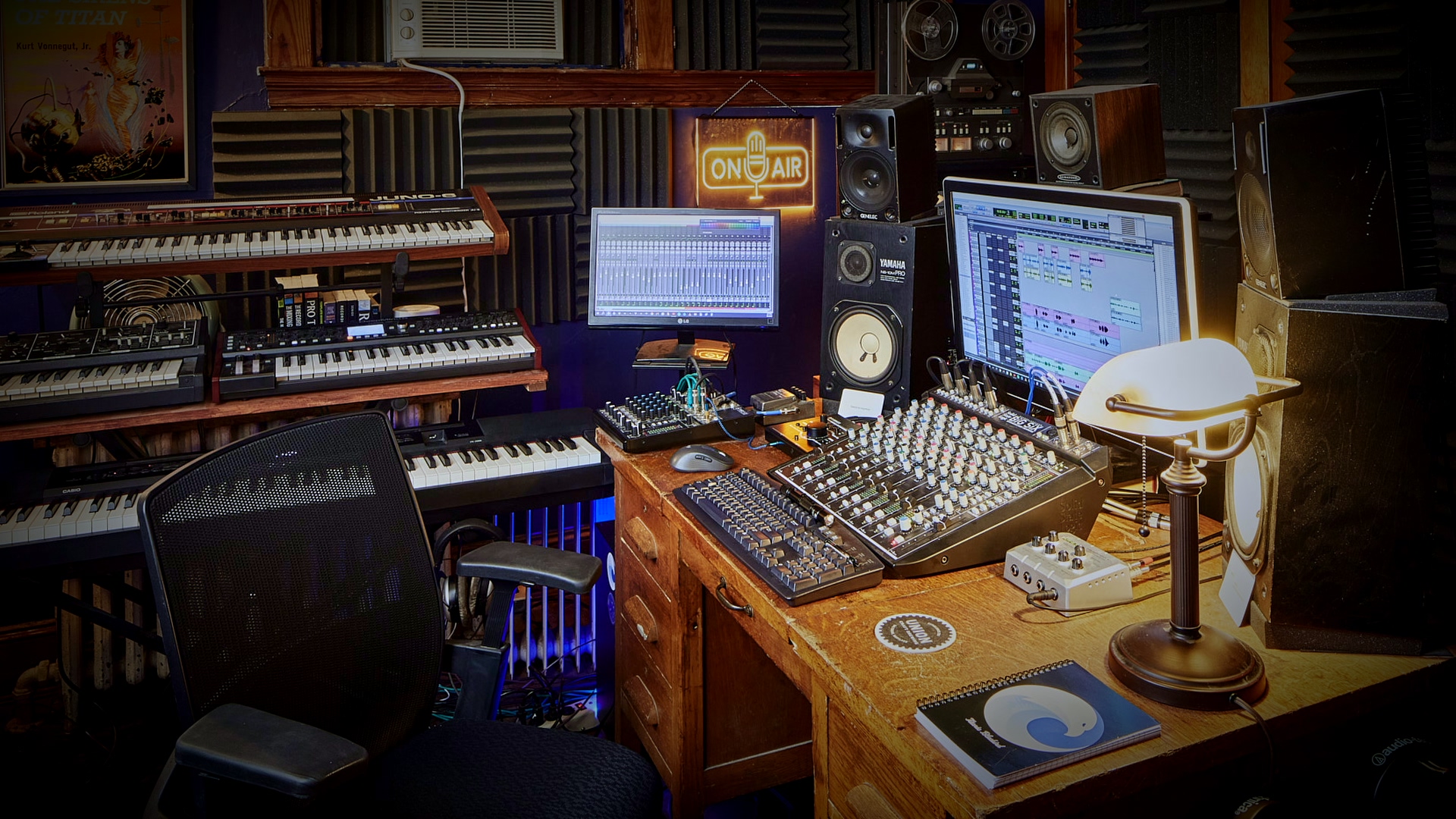 Studio tracking room with analog gear and professional acoustic treatment