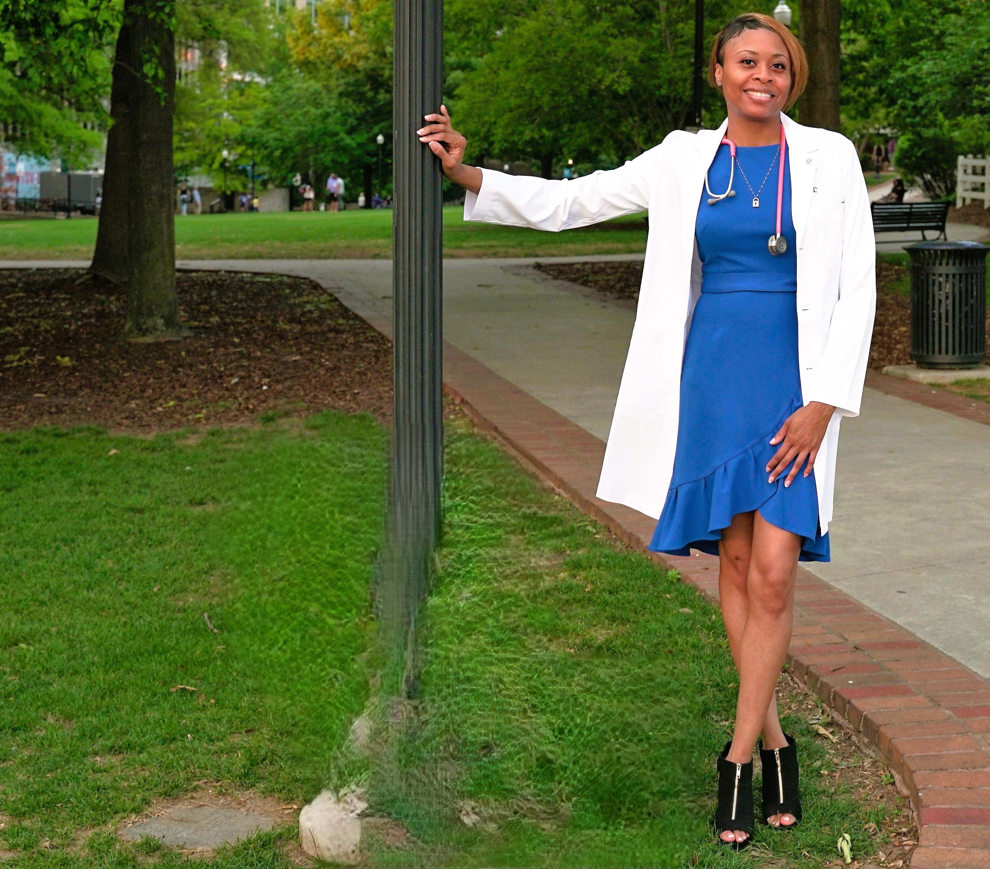 Elderly man with a warm smile in a living room.