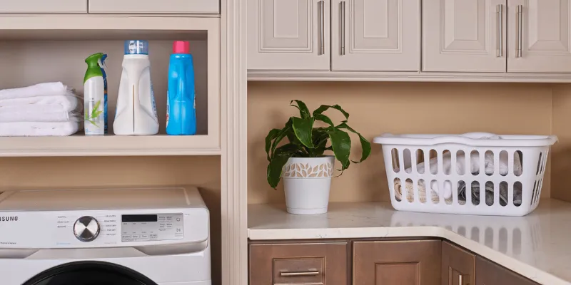 laundry room remodeled with new countertop and cabinets