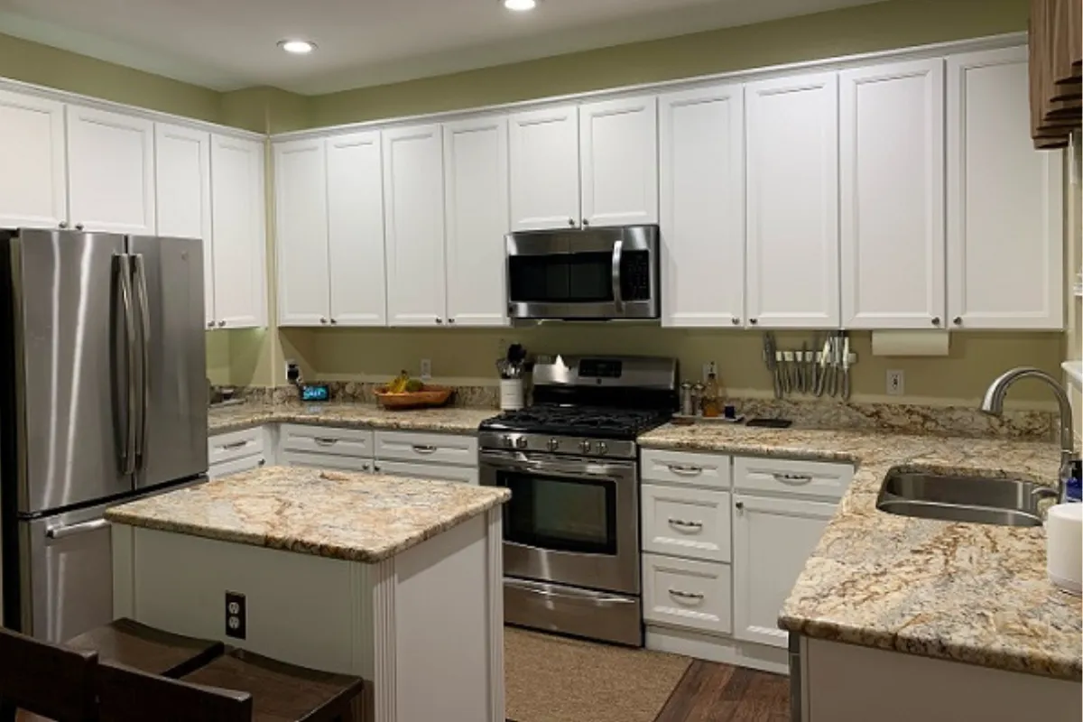 After Picture of Cabinets that were refaced with White Doors and Drawers