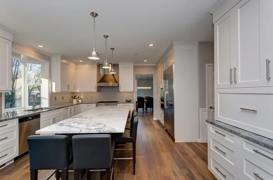 natural stone kitchen island countertop with white cabinets