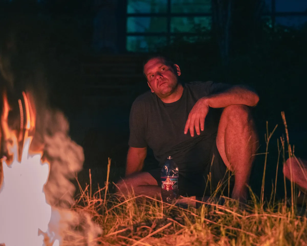 people sitting on floor front of table