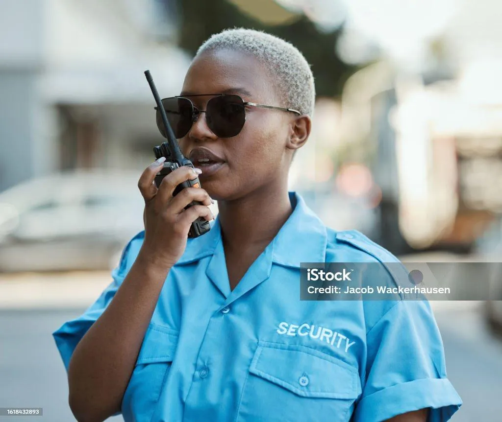 security woman in blue uniform