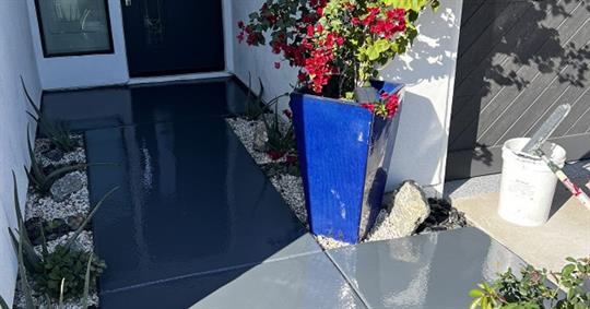 Patio walkway with a freshly applied polished concrete