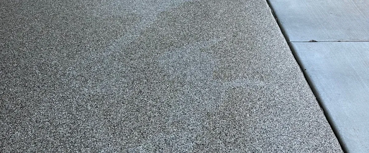 Garage with glossy natural gray epoxy floor finish