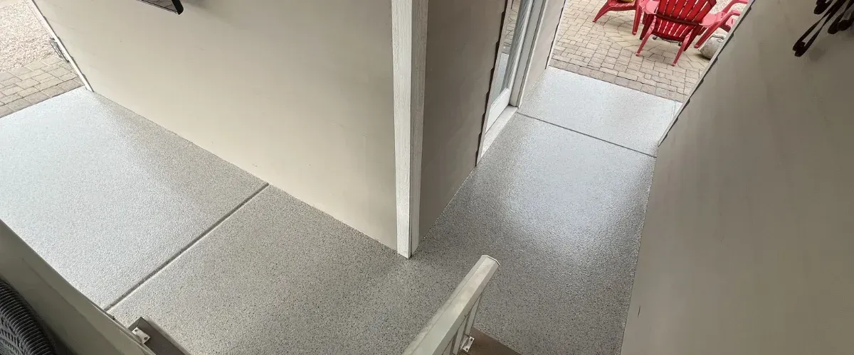 Garage with epoxy floor and elevated step platform