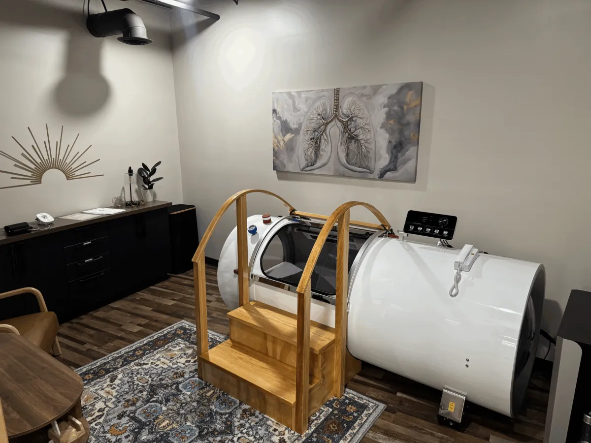 Large hyperbaric chamber in a medical room.