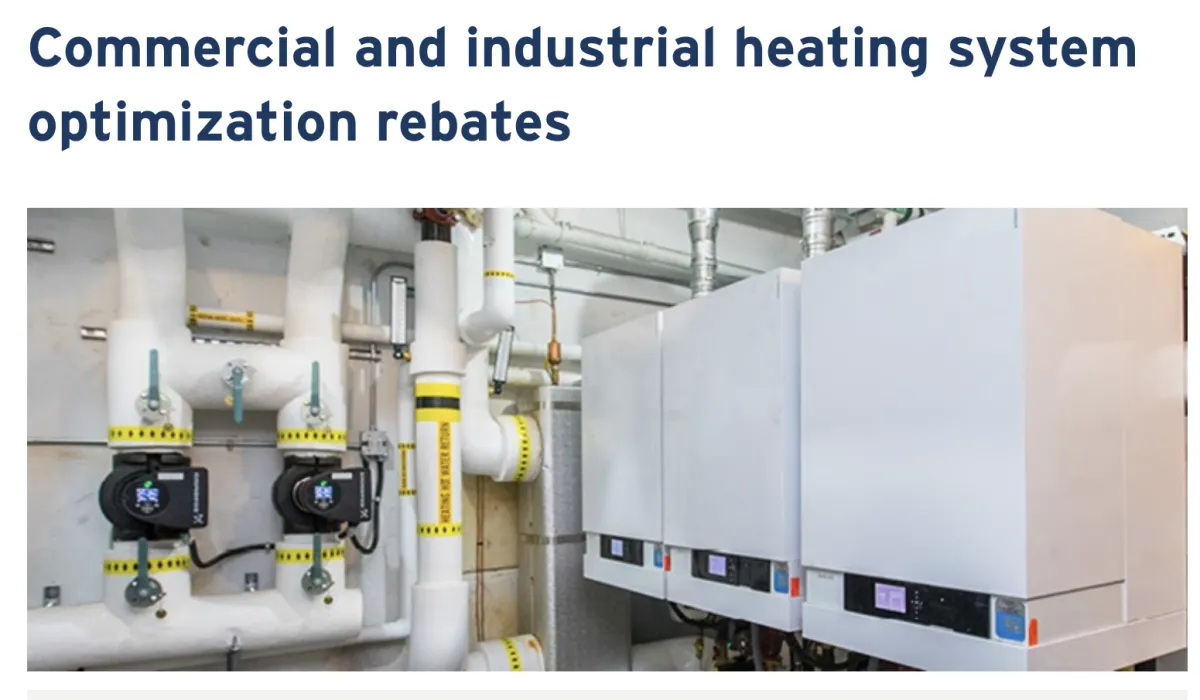 Commercial heat pump service technician performing maintenance eligible for $400 rebate
