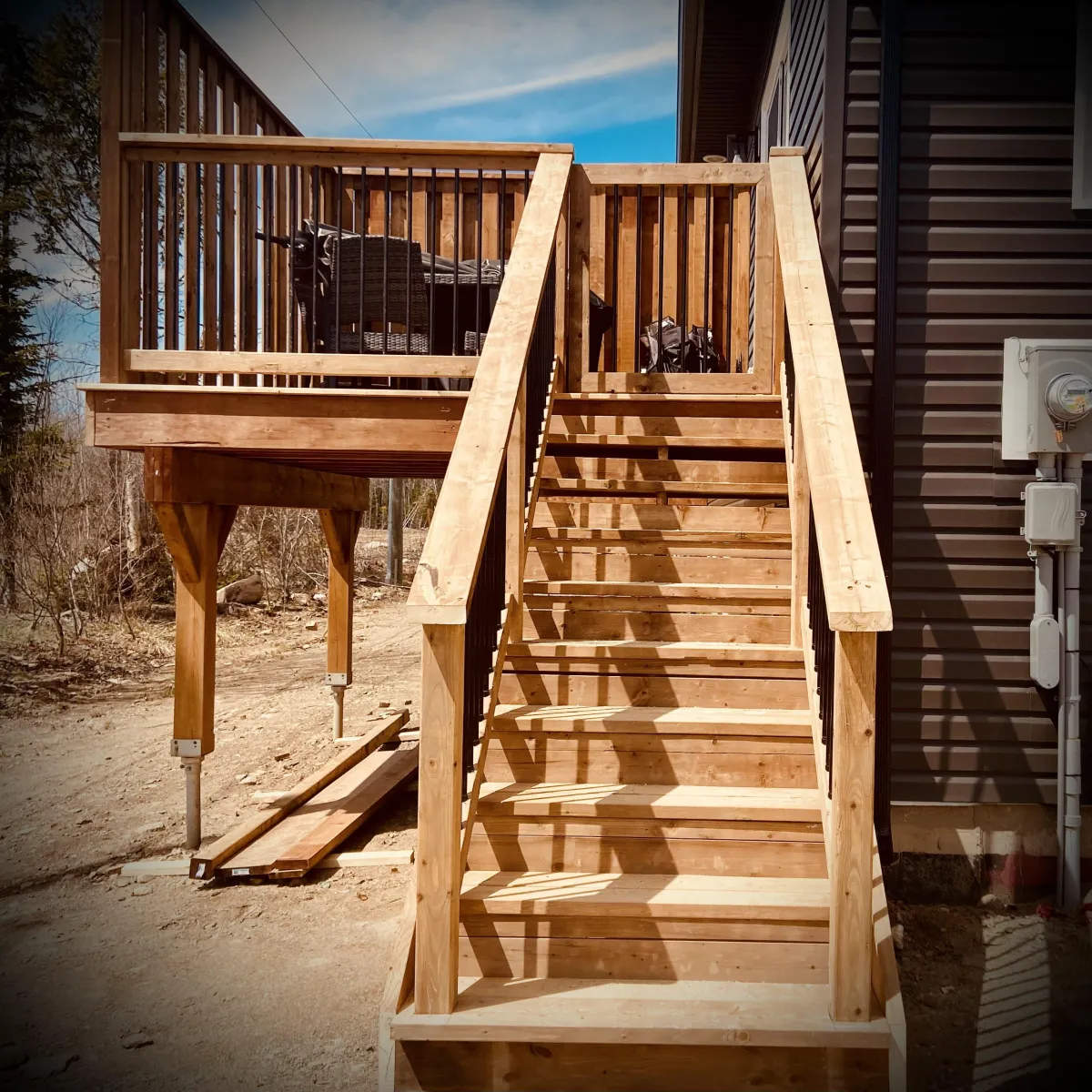 Custom step and patio builds in Fredericton backyard