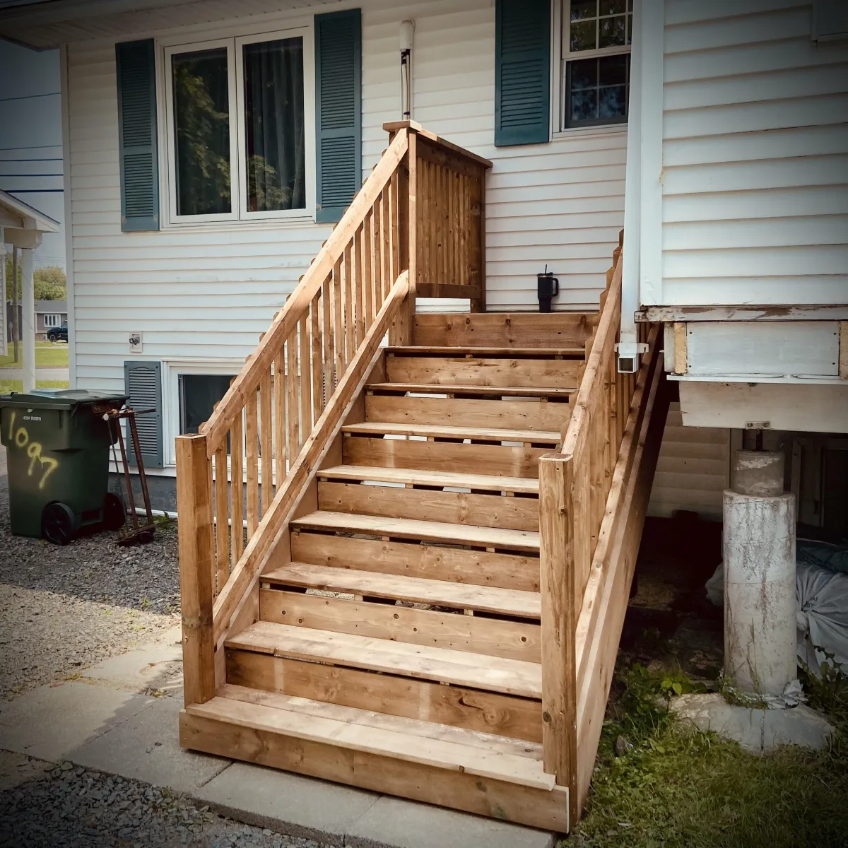 Custom step and patio builds in Fredericton backyard