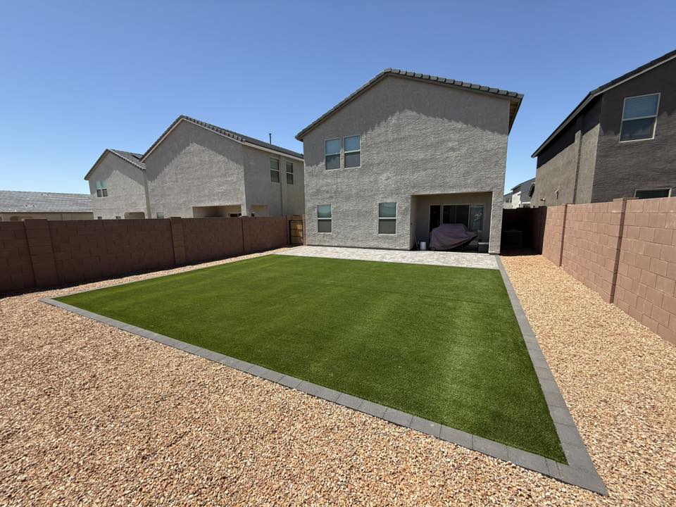 Clean artificial turf after pet odor removal service in Tucson backyard.