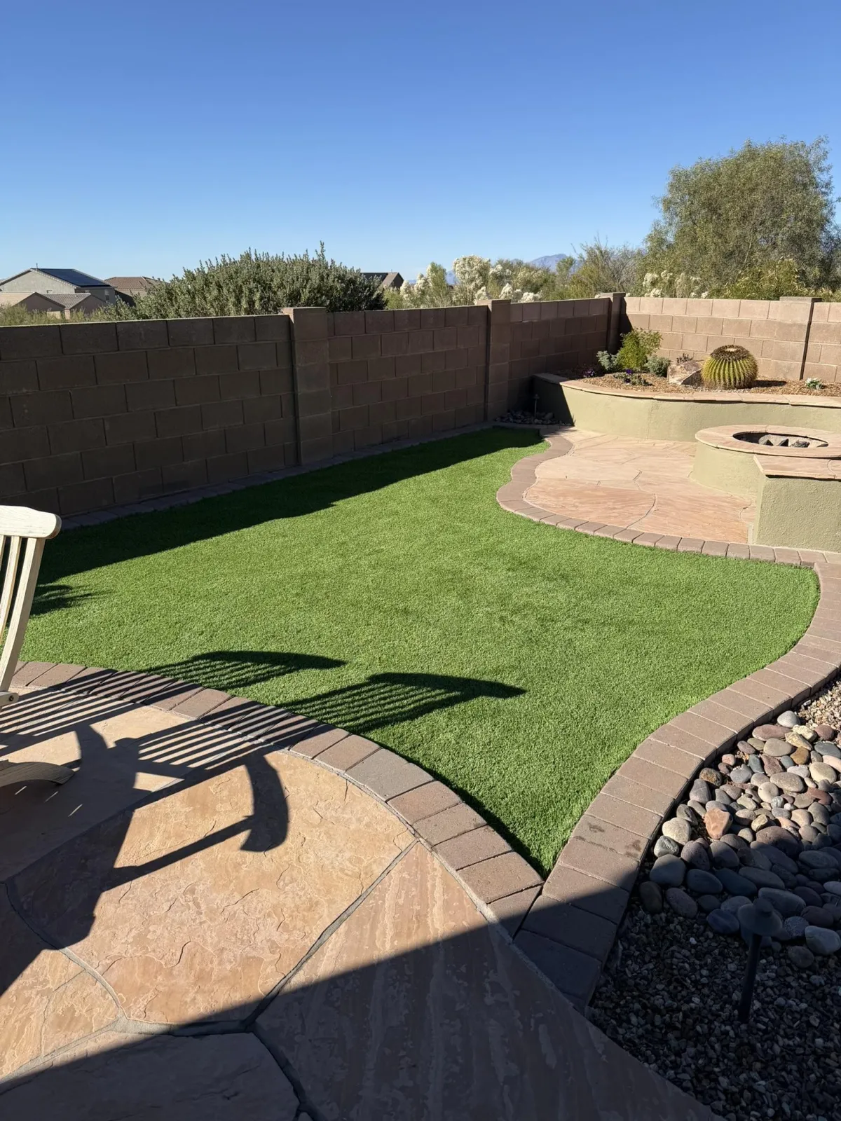 High-quality turf brushing and rejuvenation to improve drainage and appearance in Tucson lawns