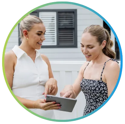 Advisor guiding a client through how life insurance protection works using a tablet.