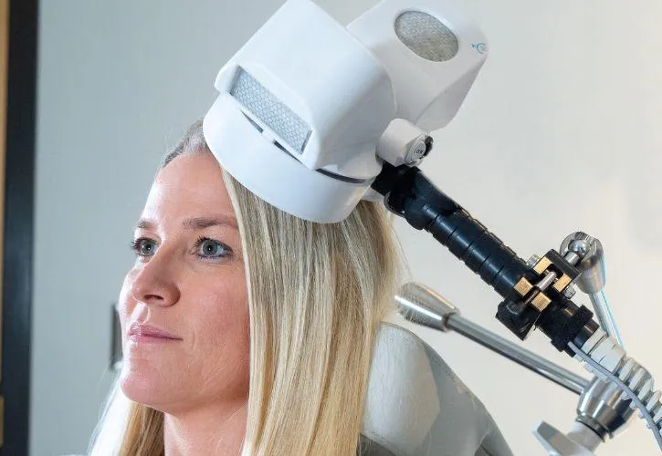 brown wooden sticks on sea during sunset