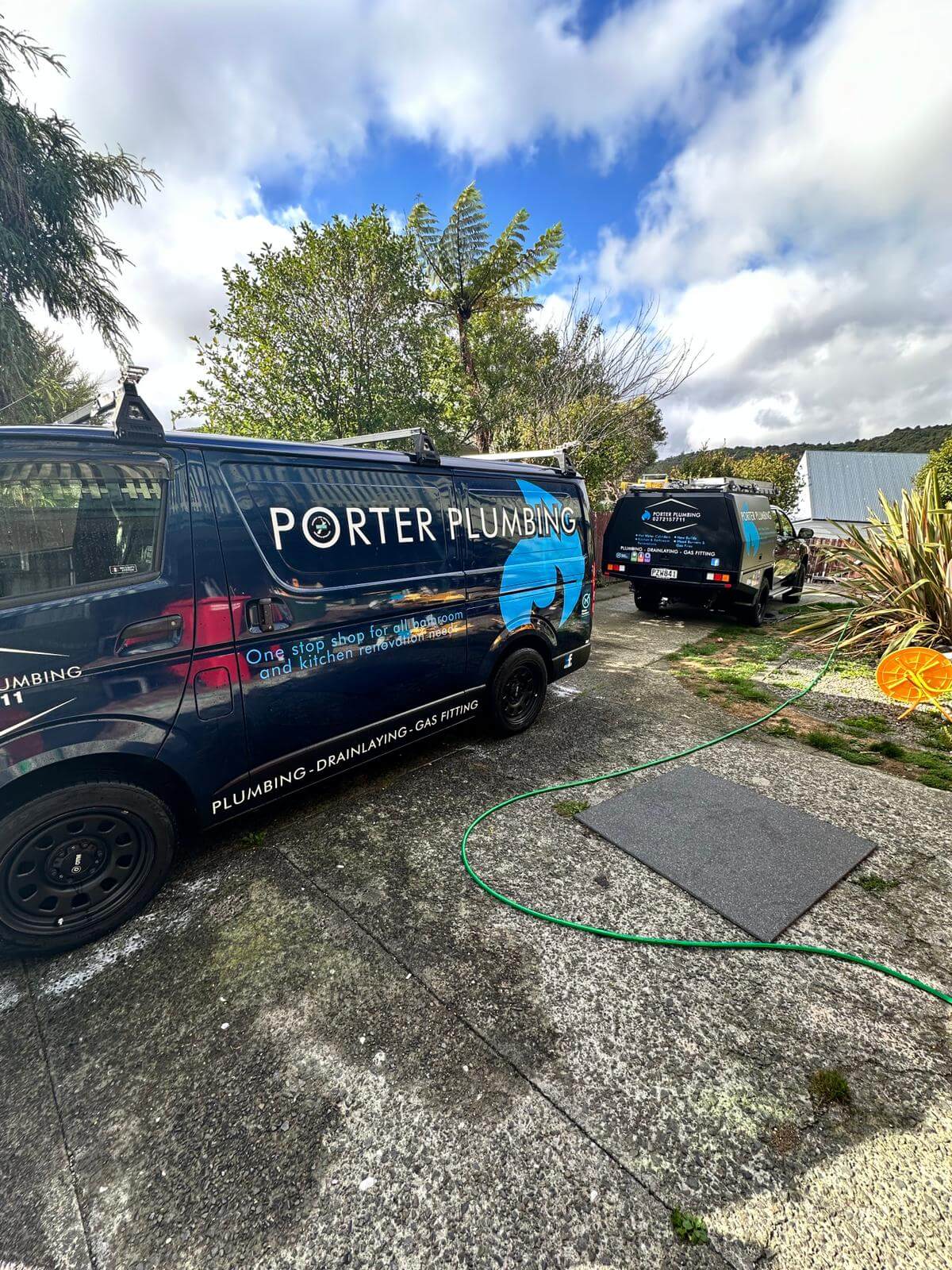 Porter Plumbing service vehicles on site in Wellington region