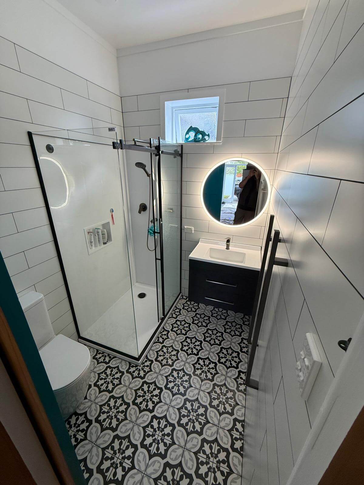 Bathroom renovation in Lower Hutt with tiled shower and modern vanity