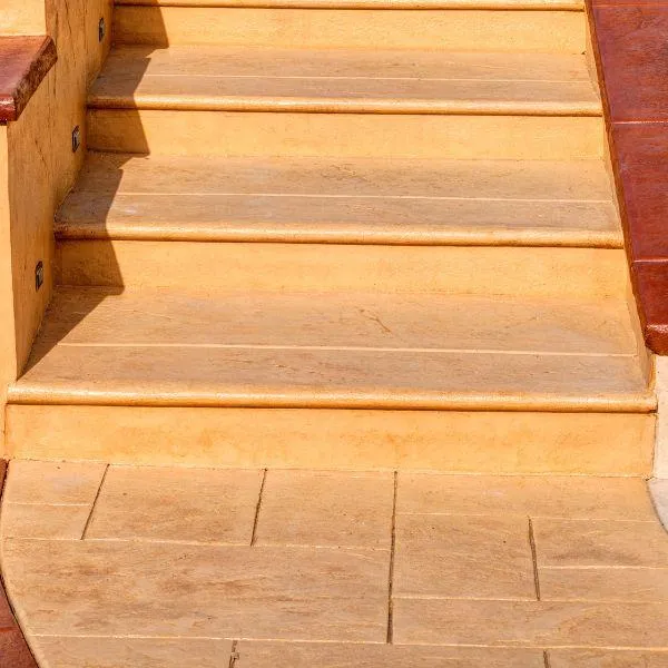 Stairway stamped concrete color orange