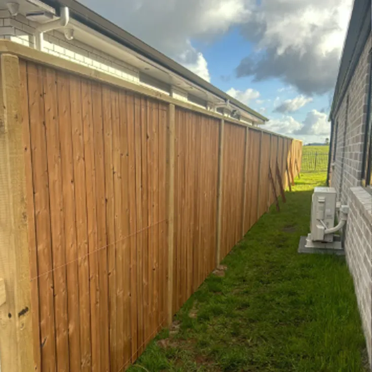 Custom-built timber fence with clean finish