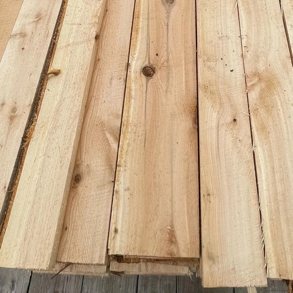 Stacks of rough-cut lumber ready for use