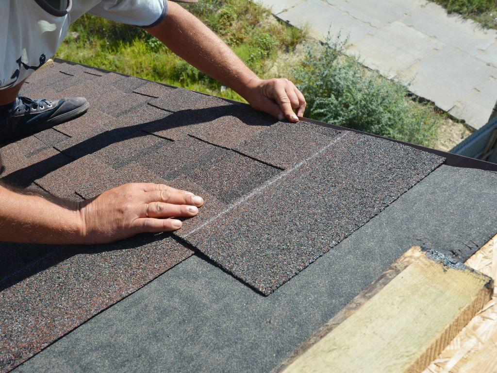 Emergency roof repair service after storm damage in Denton
