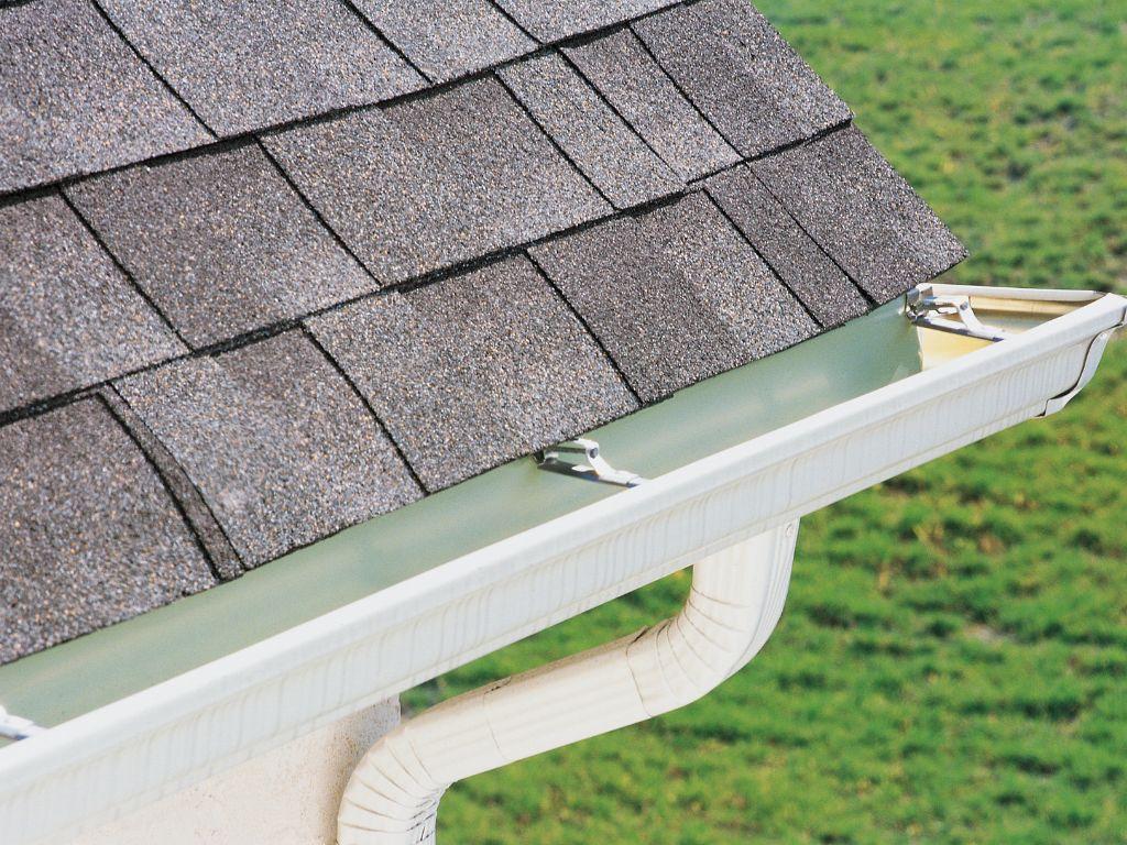 Roofing Rebels Denton cleaning clogged rain gutters and downspouts