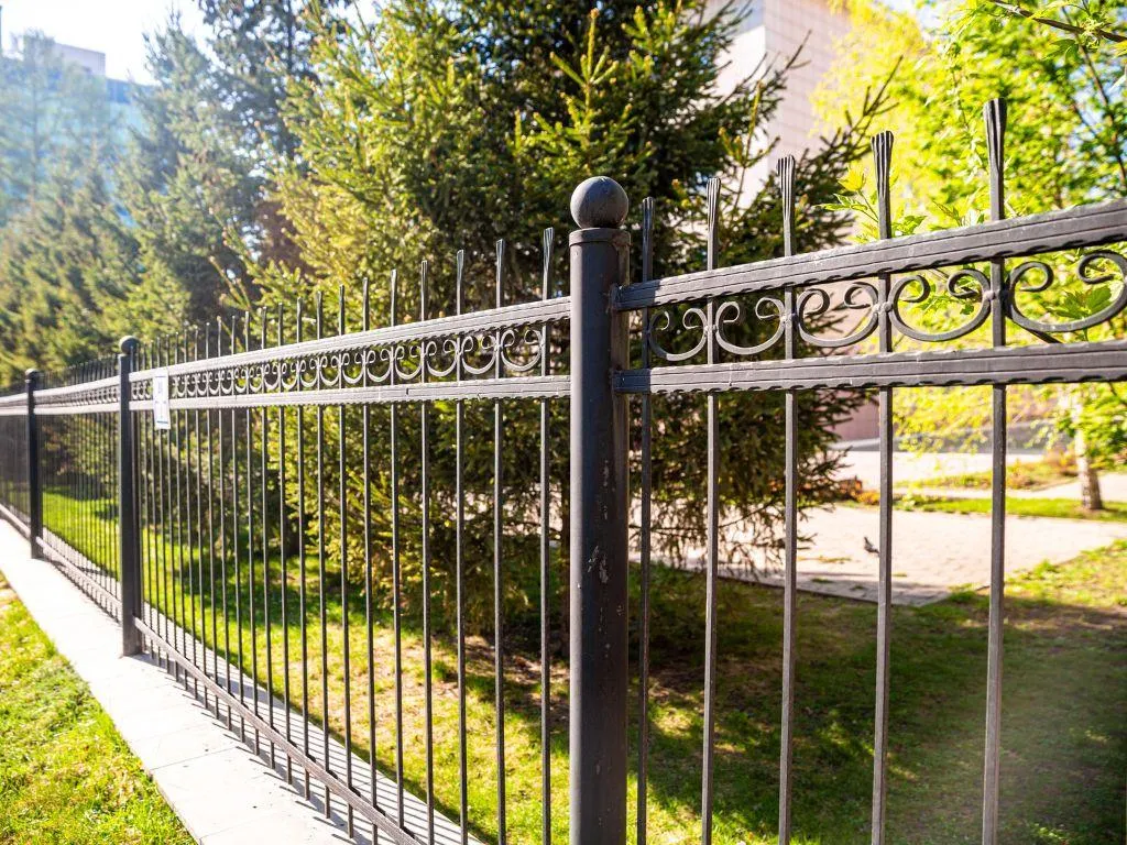 Modern horizontal wood fence with steel posts