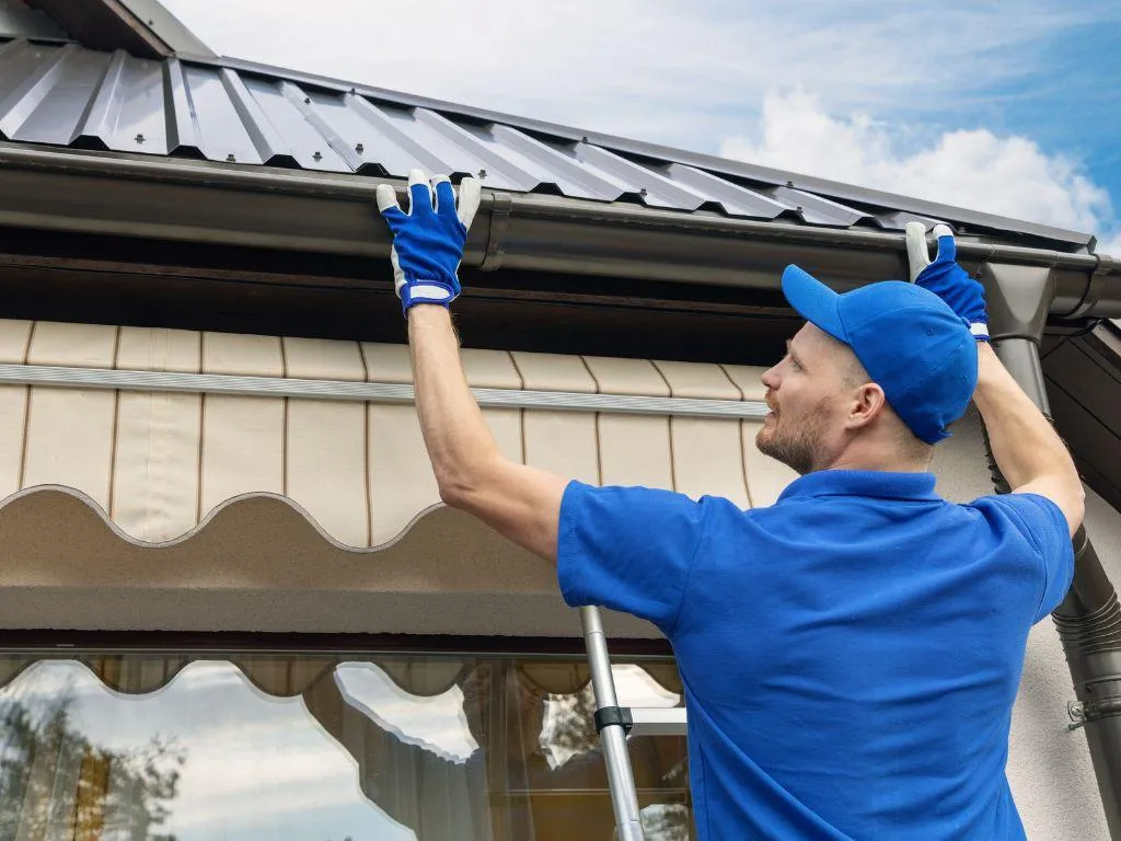 Seamless aluminum gutters installed on a Flower Mound roofline