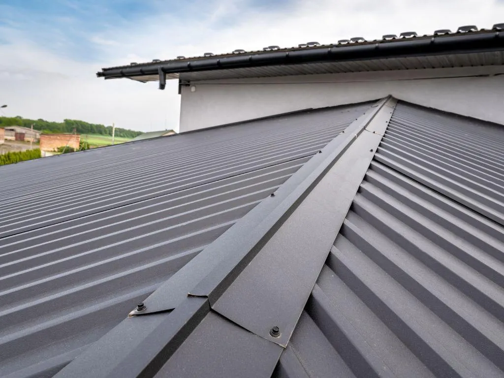 Standing seam metal roof with rain runoff system