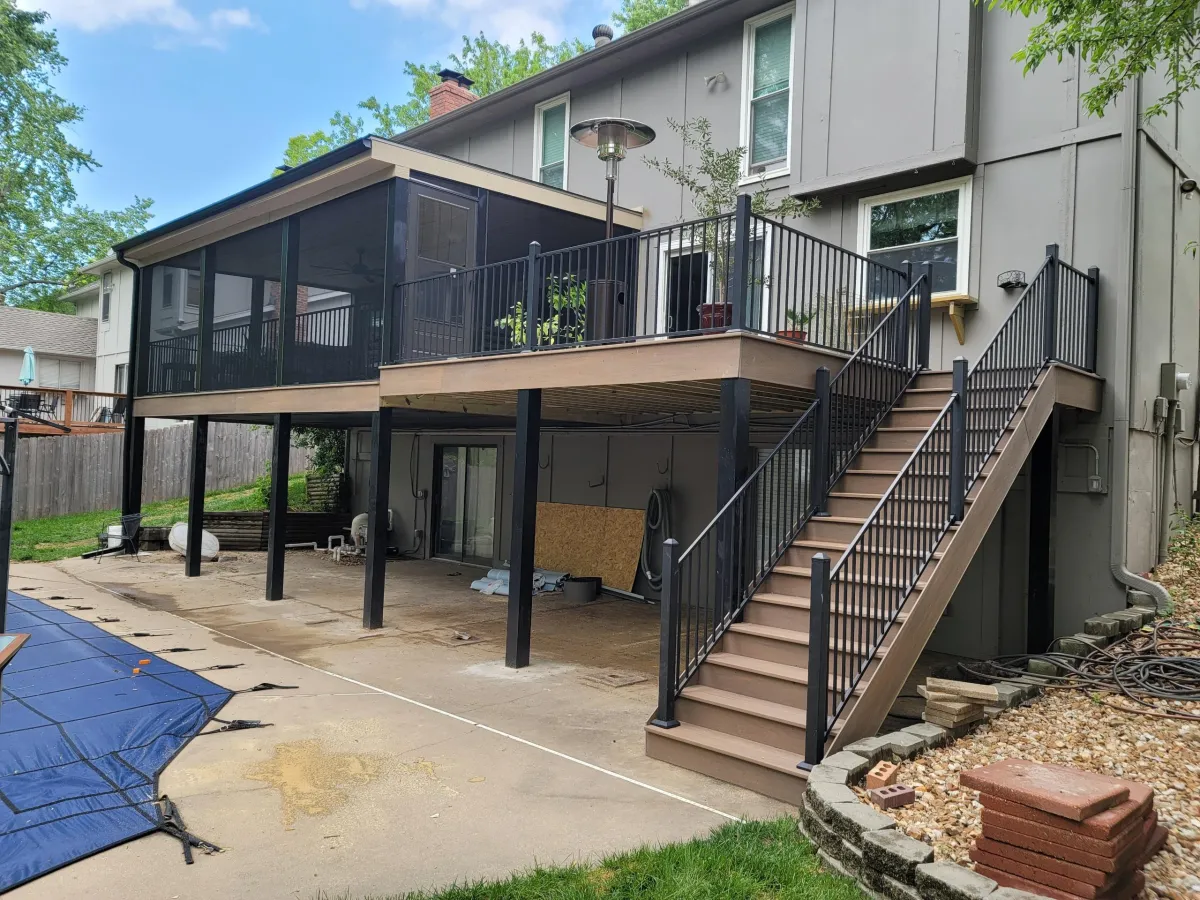 Space needle with airplane flying in blue sky