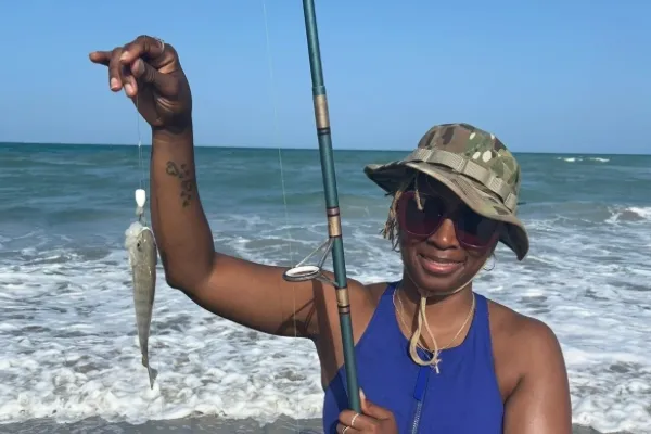 Leslie enjoying a day of fishing at the beach.