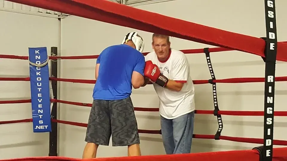boxing coach training competitive athlete at Fort Collins boxing gym