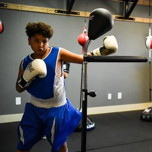 youth boxing class in Fort Collins teaching kids proper boxing technique