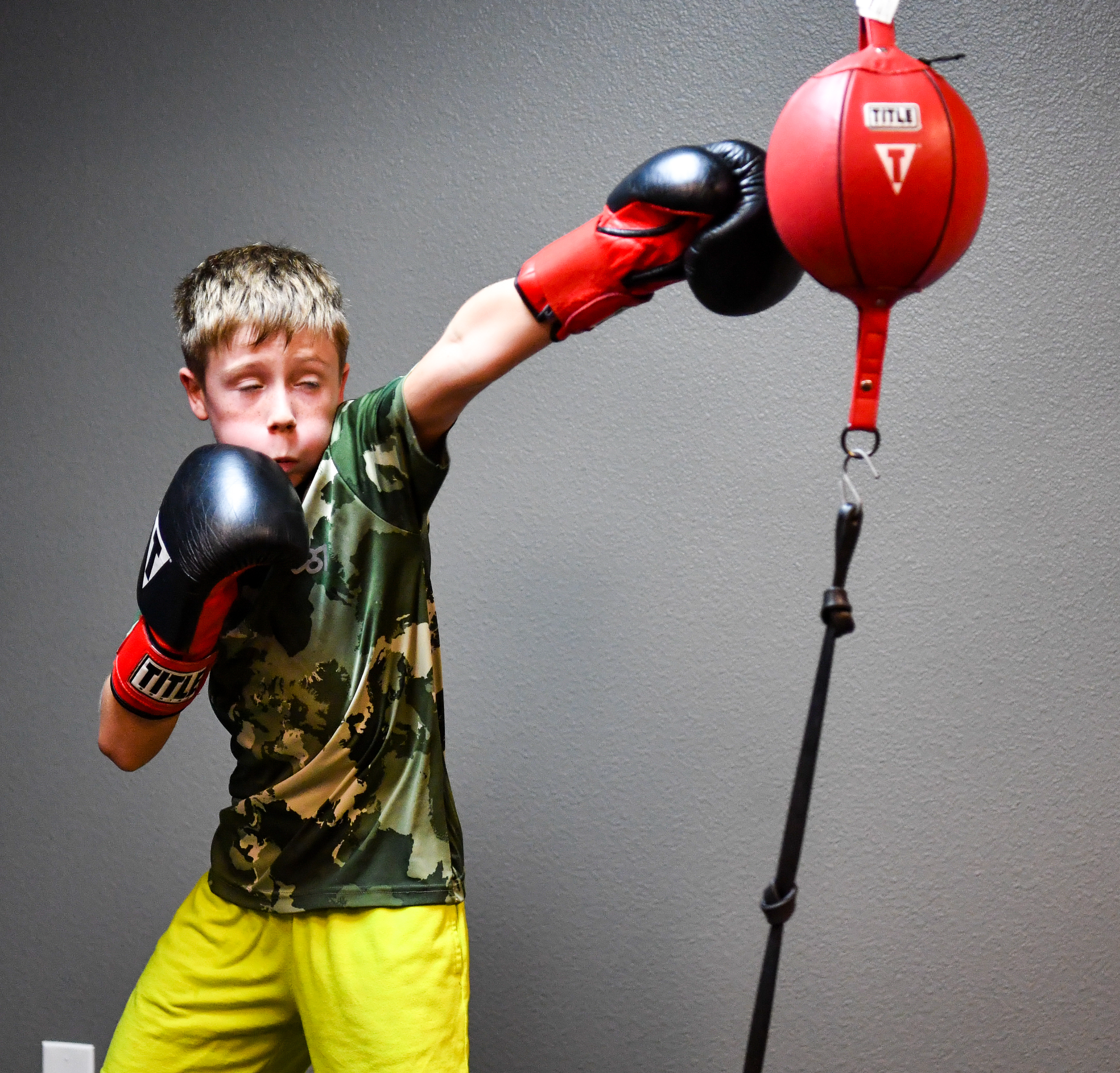 kids boxing training class in Fort Collins focused on proper punching form and technique