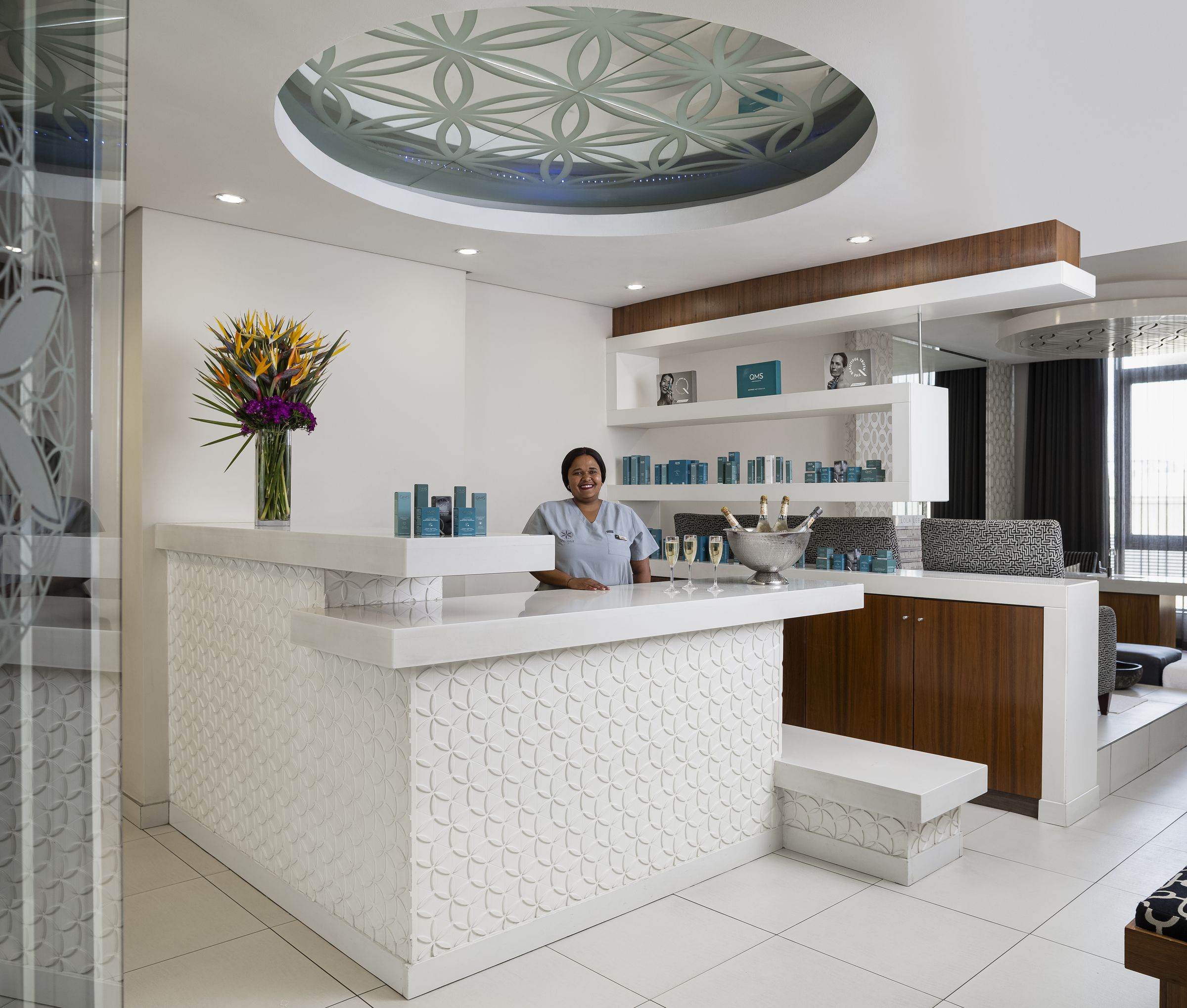 Therapist at the Da Vinci Spa reception desk, Sandton