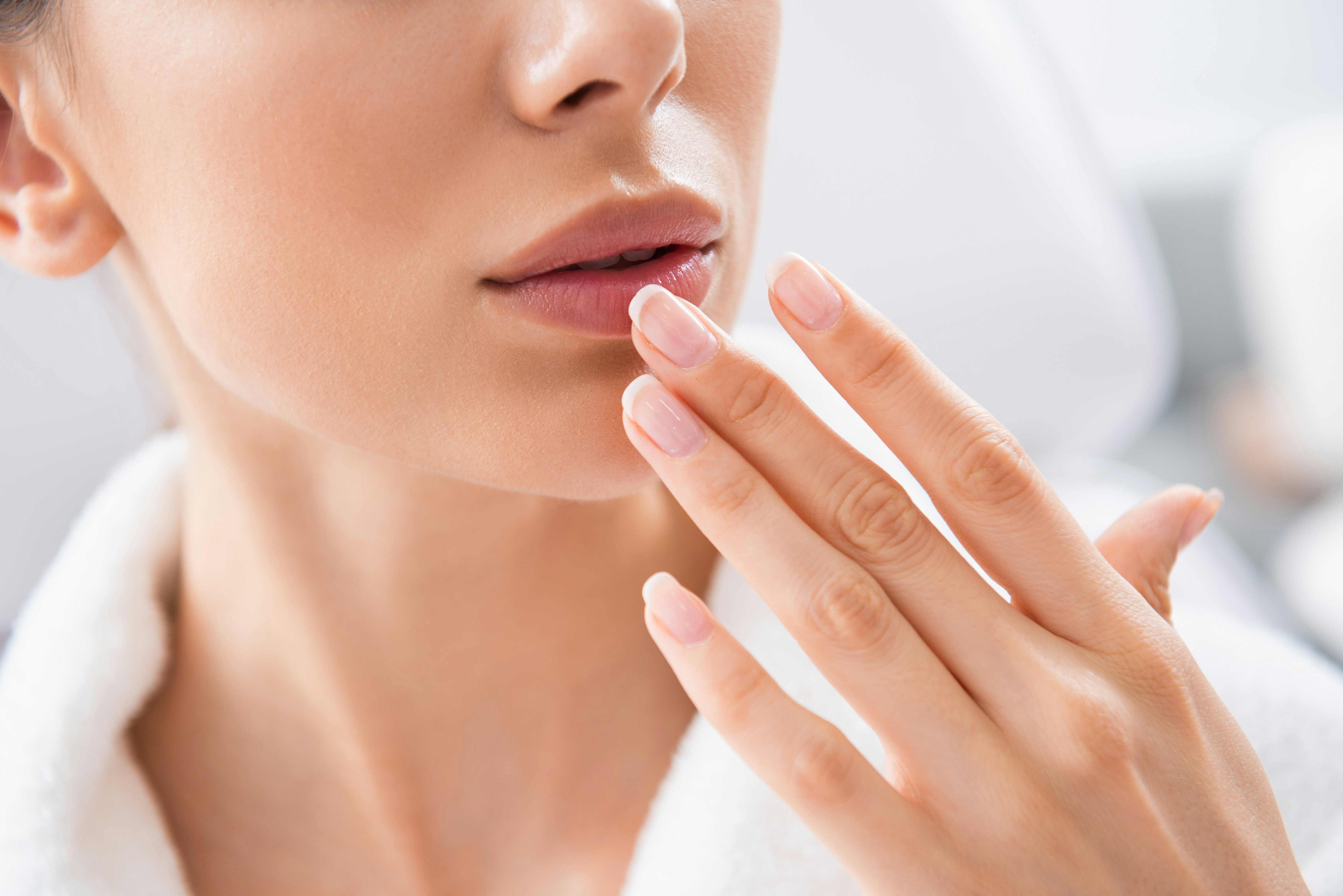 Close-up of a person receiving a facial treatment in a clinic