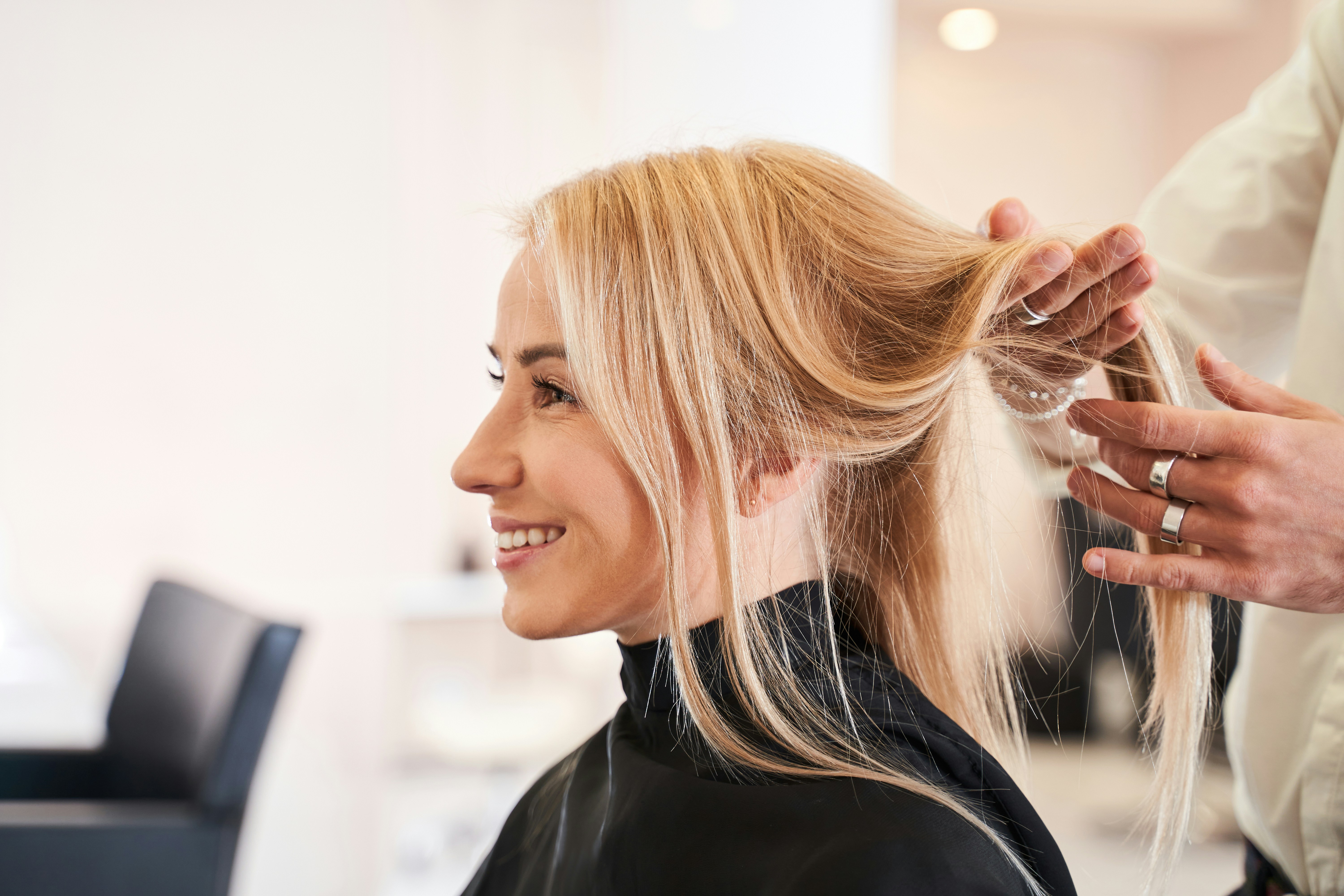 Woman receiving a hair wash at a salon